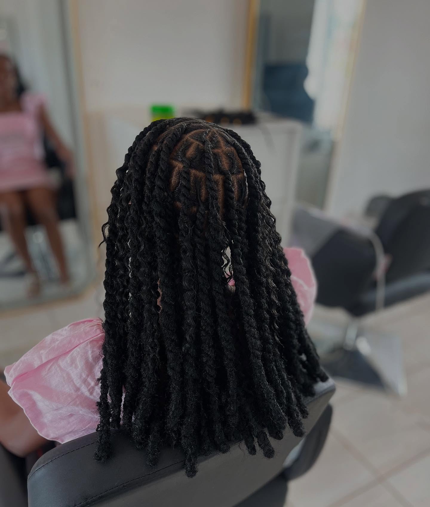 Beautiful hairstyle at Precious Hair Parlor